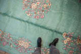 Dimensional embossed floral design in rose and ivory on the vintage Mint Green Art Deco rug.