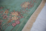Vintage Art Deco carpet, intact beige fringe, corded selvage, and mint green edge.
