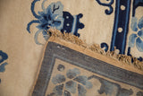 Vintage Peking rug's high pile, natural fringe, side cord selvage, and woven back.