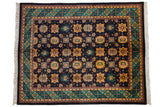 Vintage Agra carpet, navy field with saffron palmettes, emerald trefoil border, 8'1