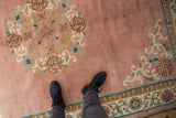 Plush rose field, scrolling blossoms, and running-t border on a vintage Japanese Peking carpet.