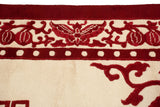 Cherry red butterfly and pearl border detail on plush ivory vintage Indian Peking rug.