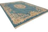 Traditional floral border of hand-knotted Aubusson design rug with sky blue field and fringe.