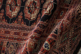 Plush, silk-like pile and fine hand-knotted weave of a vintage Pakistani Bokhara carpet.
