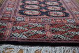 White fringe and fine geometric border in brick red, antique ivory, navy on vintage runner.