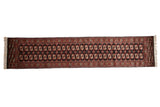 Vintage Fine Bokhara runner rug: detailed rust, ivory gul medallions on black, 2'7