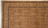 Corner of a vintage Pakistani carpet showing the intricate floral borders and lovebird motifs.