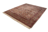 Vintage Kerman carpet with ivory allover floral palmettes and lotus design, cochineal red border.
