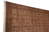 Corner detail of a hand-knotted Pakistani Isfahan rug with its intact selvage and full, lustrous wool pile.