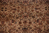 Intricate floral vinery with navy and terracotta details on a soft, full-piled wool carpet.
