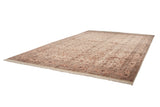 Full angled view of a lustrous vintage Pakistani carpet with a dense Isfahan-style floral design.