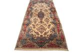 Full perspective of a vintage Persian Kerman carpet highlighting its impressive length and floral design.