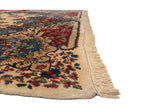 Intact side cord selvage and full plush pile of a vintage Persian Kerman rug.