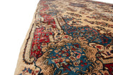 Long angle view showing the plush, full pile and Rococo-stylized border of a vintage Kerman.