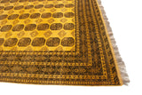 Afghani Daulatabad carpet corner with saffron yellow gul pattern, geometric border, and fringe.