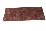 Antique Beshir carpet with geometric multi-panel diamond medallions showing inverted red, navy, and sand coloration.