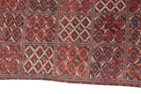Intricate border and geometric field of a collector-quality antique Turkmen Beshir carpet.