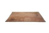 Plush dusty rose Art Deco rug corner with ornate teal, terra cotta foliage, and intact fringe.