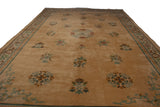 A view down the length of the vintage Japanese carpet highlights its soft pile and floral motifs.