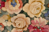 Plush pile of Japanese Savonnerie design with rose bouquets in cream, rose, and green.