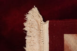 Ivory fringe, corded edge, and black cherry red panel of a Japanese Savonnerie rug.