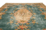 Sprawling Rococo stylized leaves and rose bouquets in ocean green blue and ivory.