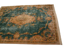 Vintage Japanese Aubusson rug corner with ocean green field, rococo floral spandrel and border.