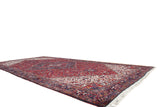 Angled perspective of the large vintage Mehrivan carpet, displaying its full length and intricate medallion.