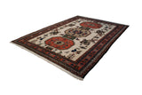 Mid-20th century Vintage Persian Meshkin carpet; ivory field, triple geometric medallions, boteh, birds, rust, olive, blue.