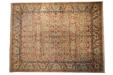 Vintage Indian Bijar design carpet with a multi-panel floral lattice in dusty red, gold, and powder blue.