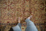 The soft, full wool pile and intricate floral vinery of a vintage Bijar design carpet.