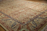 Lustrous, full wool pile of a vintage Indian carpet showing the detailed scrolling palmette border.