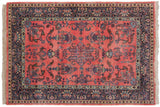 Vintage Indian Mohajeran Sarouk carpet, ruby red field, navy border, detailed vase and boteh motifs.