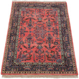 High luster ruby red field showing ornate vases, navy cloudbands, and germinating plants.