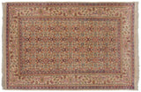 Vintage Indian Mahal carpet with a repeating Herati motif in red, slate blue, and yellow on a beige field.