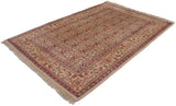 Angled view of a vintage Indian Mahal rug showing a lustrous pile and allover Herati motif.