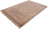 A hand-knotted Indian Mahal carpet laid out at an angle, displaying its intricate Herati pattern.