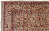 Corner detail showing the intricate Herati and samovar motifs of a vintage Mahal carpet.