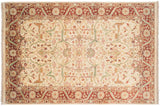 Indian Bijar rug corner with ivory field floral arabesques, meandering vine, terra cotta border.