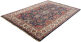 Intricate floral arabesques and vinery in dusty navy blue, blush, and ivory tones.