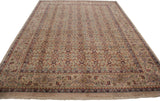 Beige, red, and blue partial Herati and samovar border and allover motif on a vintage Indian Mahal carpet.