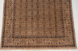 Vintage Indian Mahal rug corner, showing Herati motif, samovar border, and beige fringe.