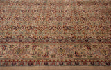 Vintage Indian Mahal rug's main border featuring samovar design and floral motifs in beige, red, and blue.