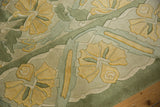 Embossed saffron yellow palmettes and sea foam green leaves on plush Indian Arts and Crafts rug.