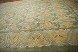 Plush carved saffron yellow floral palmettes and sea foam green Arts and Crafts border.