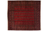 A vintage fine Bokhara square carpet with repeating gul medallions on a rich cherry red field.