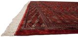 Plush cherry red pile and intact side selvage on a fine vintage Bokhara carpet.