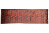 A fine vintage Bokhara rug runner with repeating gul medallions in cherry red and navy blue.