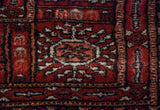 The tight, fine weave and plush wool pile of a Bokhara gul motif.