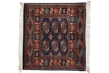 Fine vintage Bokhara square rug with a dense pattern of gul medallions in navy blue, rust, and ivory.